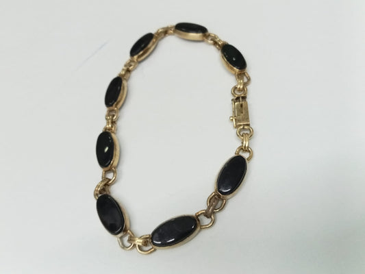 pulsera de oro 10k -diseño sinteticos negros