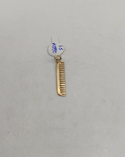 Dije de peine ORO 10k peso 1.3gr, usado