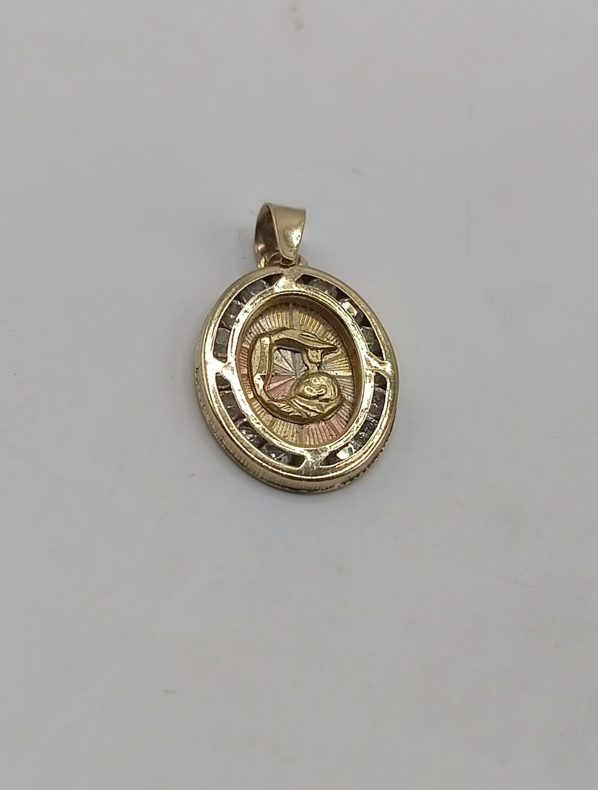 Dije de ORO 10k peso .9gr, usado