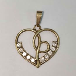 Dije de corazón con sintéticos 10k p 1.4 gr