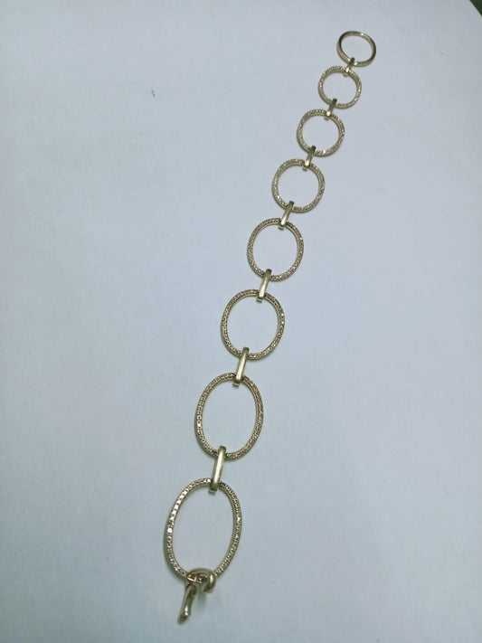 Pulsera de Oro 10k – Aros Entrelazados con Chispitas