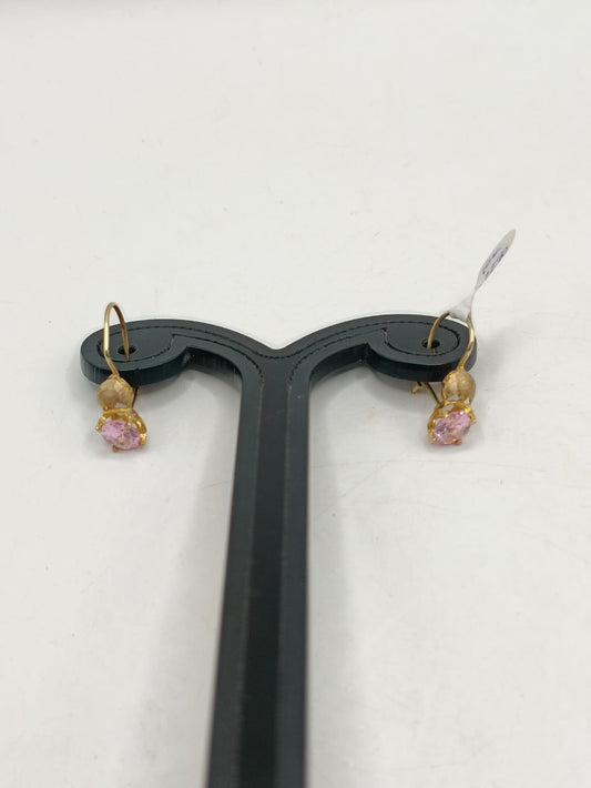 Aretes sintetico rosa ORO 10k peso 1.5gr, usado