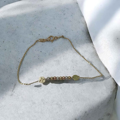 Oro Pulsera bolitas tres oros 10k .9g