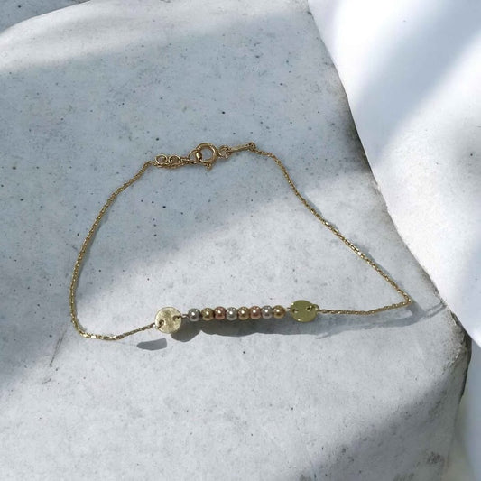 Oro Pulsera bolitas tres oros 10k .9g