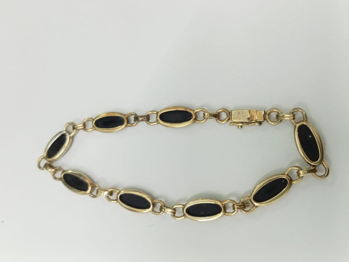 pulsera de oro 10k -diseño sinteticos negros