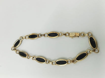 pulsera de oro 10k -diseño sinteticos negros