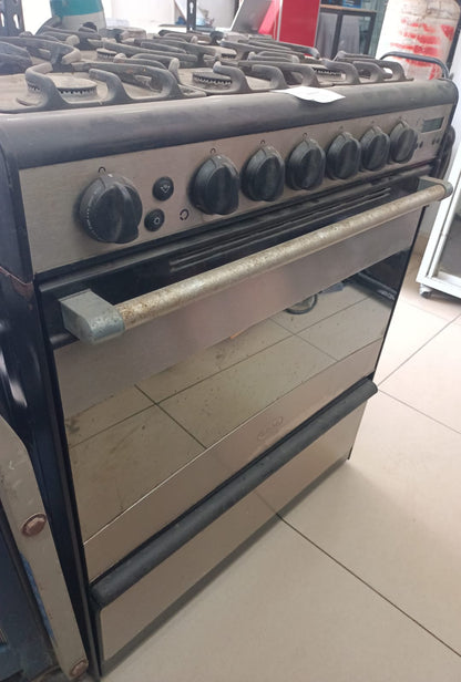 Estufa MABE x05500p 6 quemadores acero inaxidable, usado