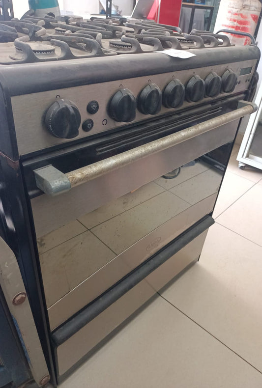 Estufa MABE x05500p 6 quemadores acero inaxidable, usado