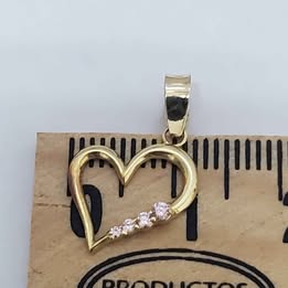 DIJE DE CORAZON DE ORO DE 14 KILSTES CON PESO DE 0.6 GRAMOS