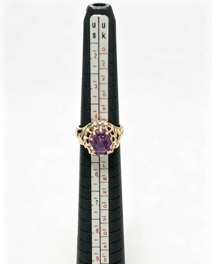 Oro anillo piedra morada 8k 2.3grs