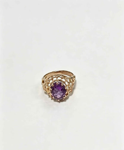 Oro anillo piedra morada 8k 2.3grs