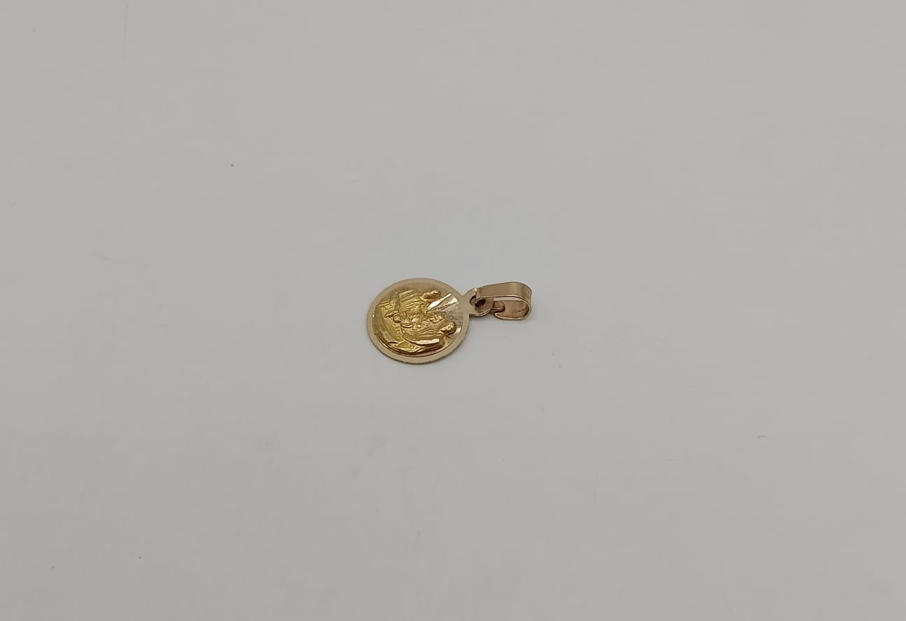 Medalla religiosa oro 10K peso 1gr, usado