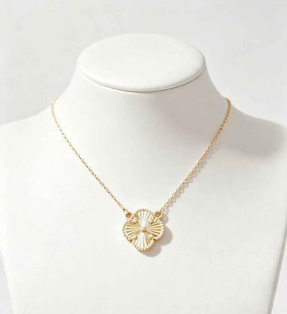 Oro cadena con flor 10k 2g