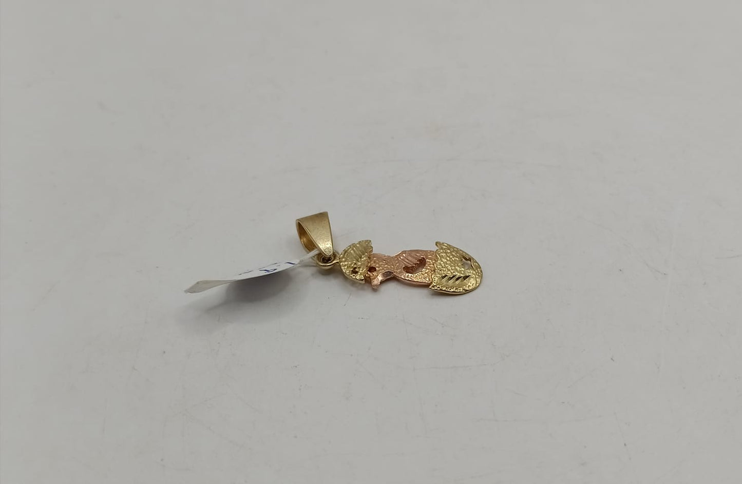 Dije de ORO 10k peso 1.9gr, usado