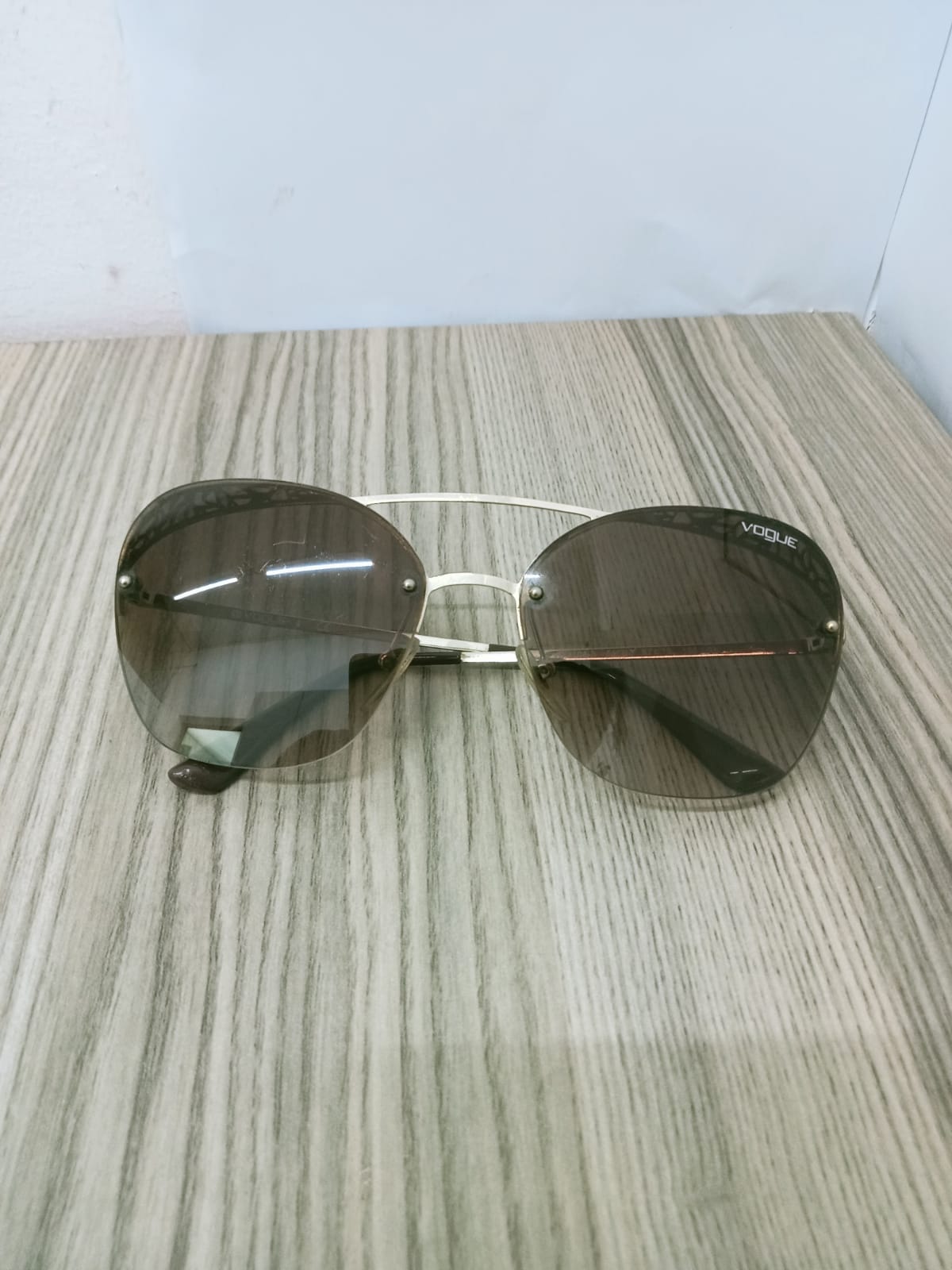 lentes vogue dorados-usados