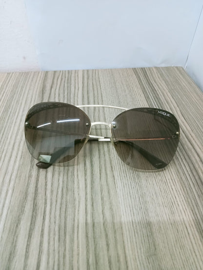 lentes vogue dorados-usados