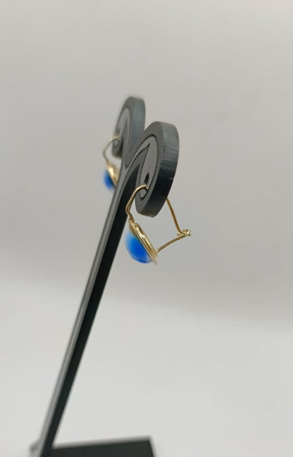 Arete con sintetico azul ORO 10k peso 1.8gr, usado