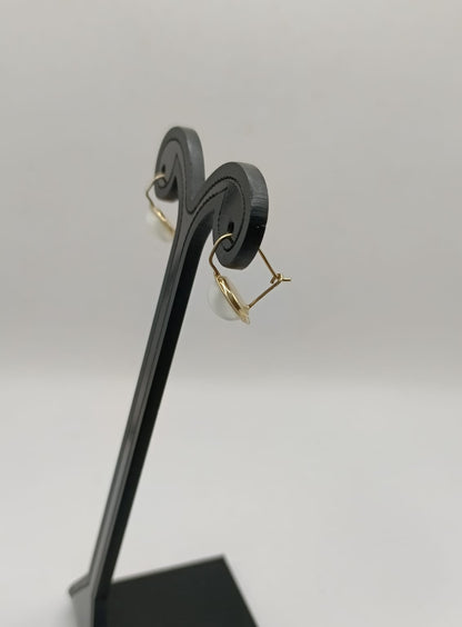 Aretes sintetico blanco ORO 10k peso 1.9gr, usado