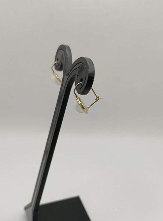 Aretes sintetico blanco ORO 10k peso 1.9gr, usado