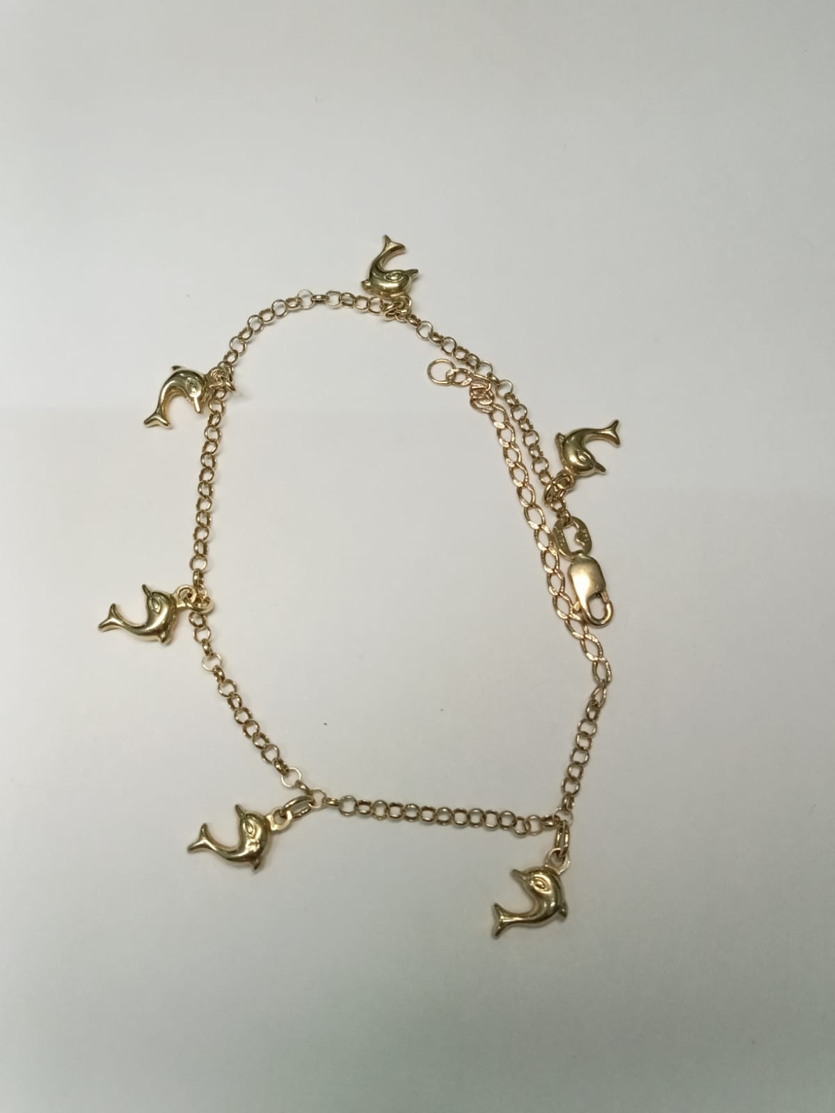 pulsera de oro con charms de delfin -10k