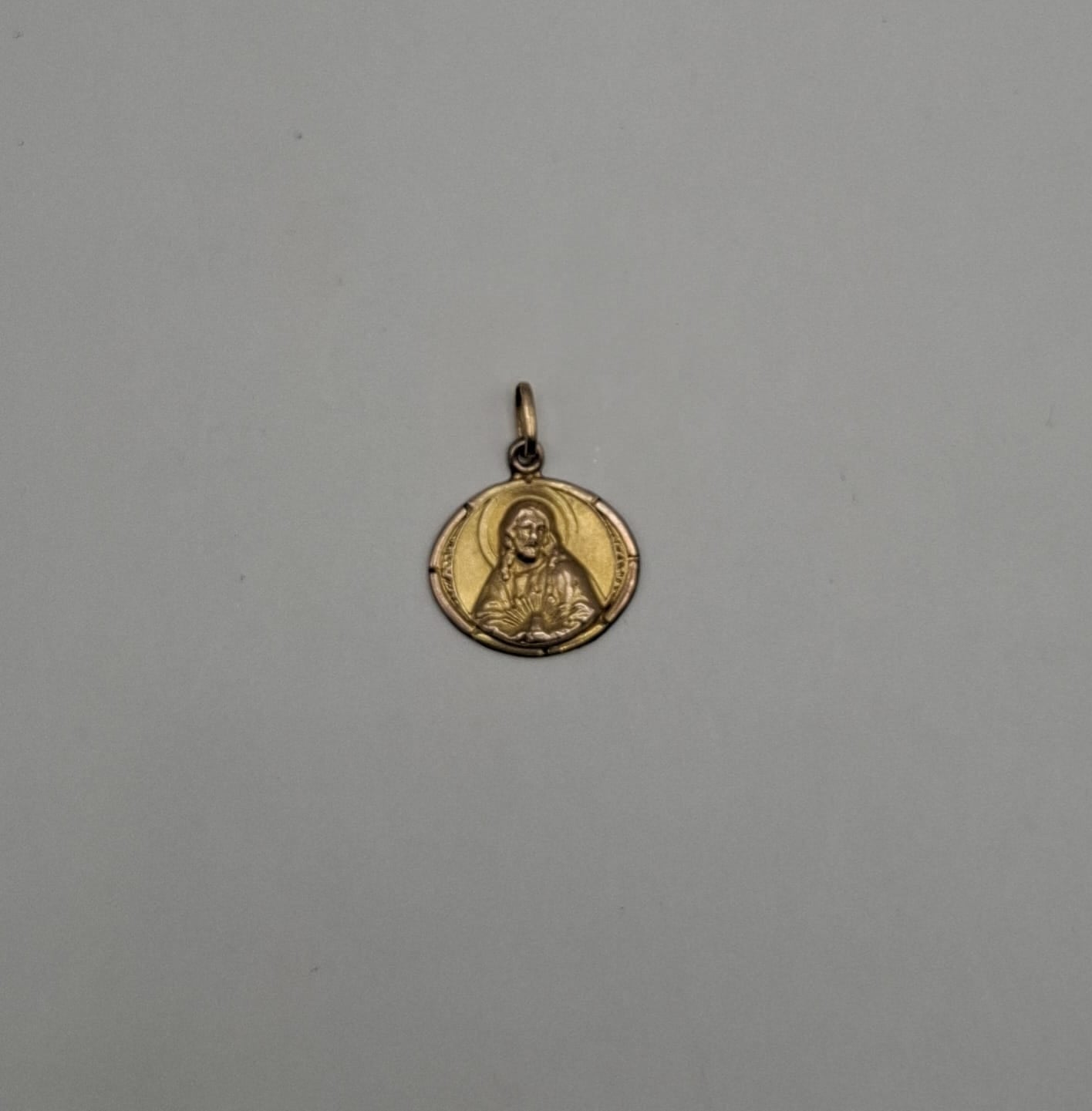 Dije sagrado corazon ORO 10k peso 1gr, usado