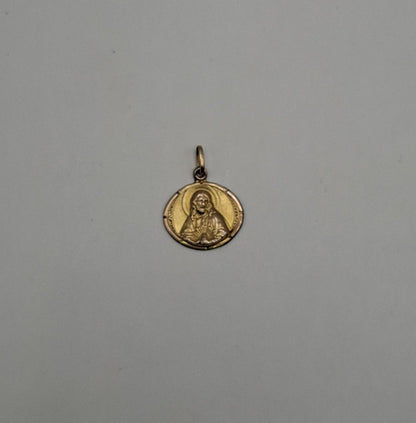 Dije sagrado corazon ORO 10k peso 1gr, usado