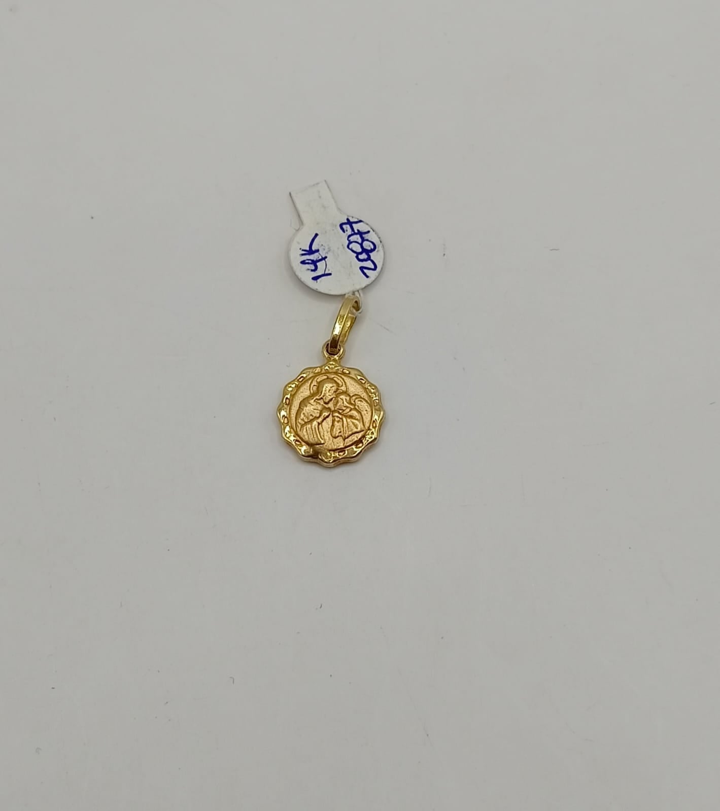 Dije religioso oro 14k peso 1gr, usado