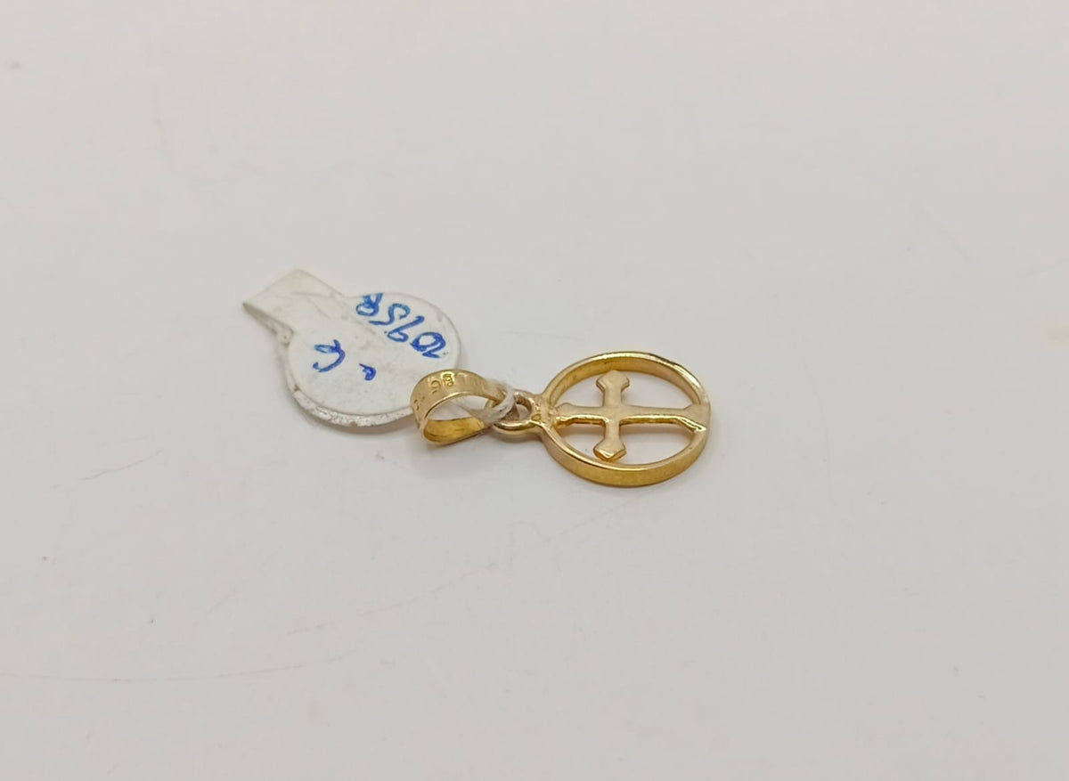Dije de cruz en circulo ORO 10K peso .6gr