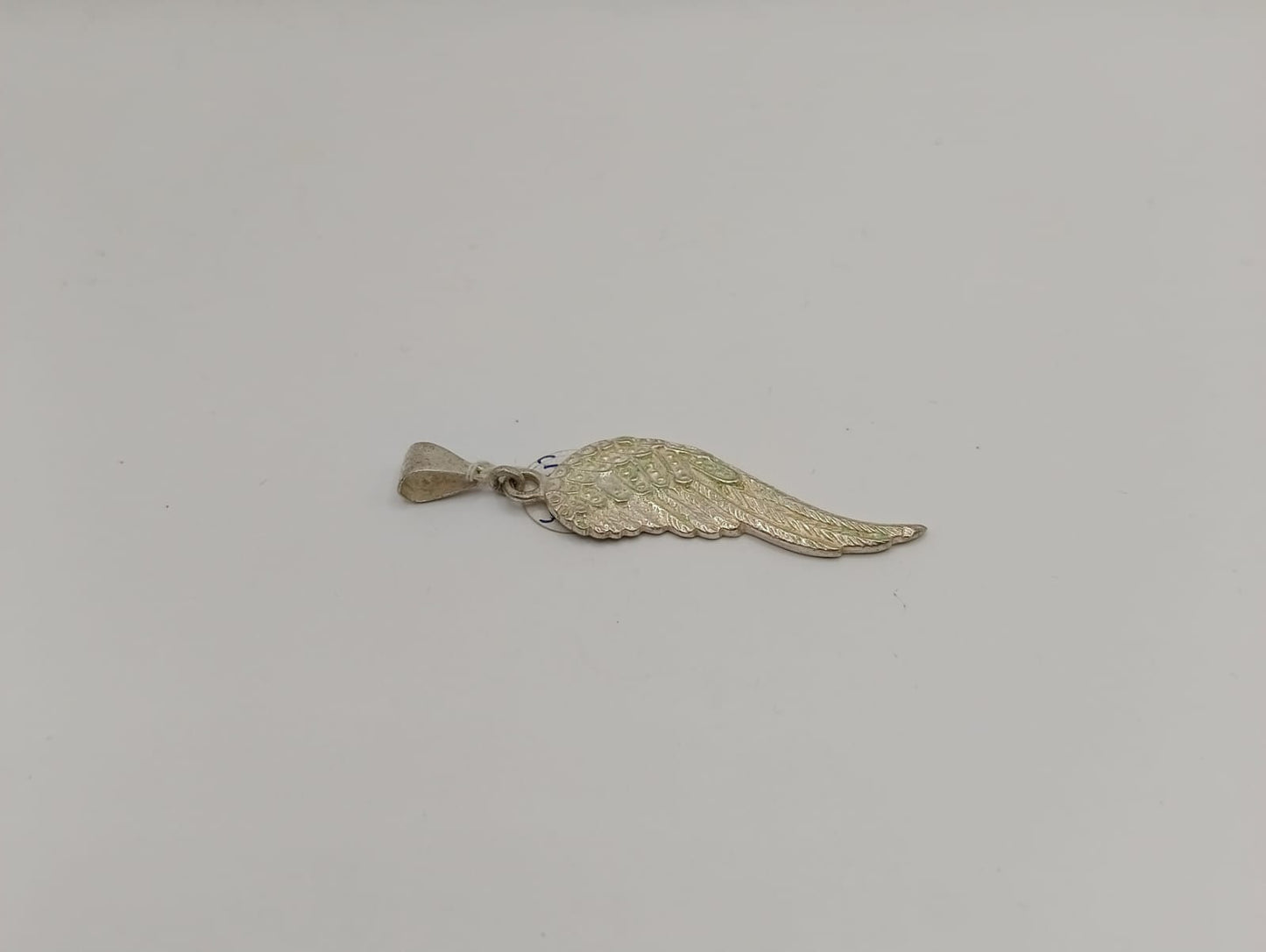 Dije de Ala PLATA 925 peso 3.6gr, usado