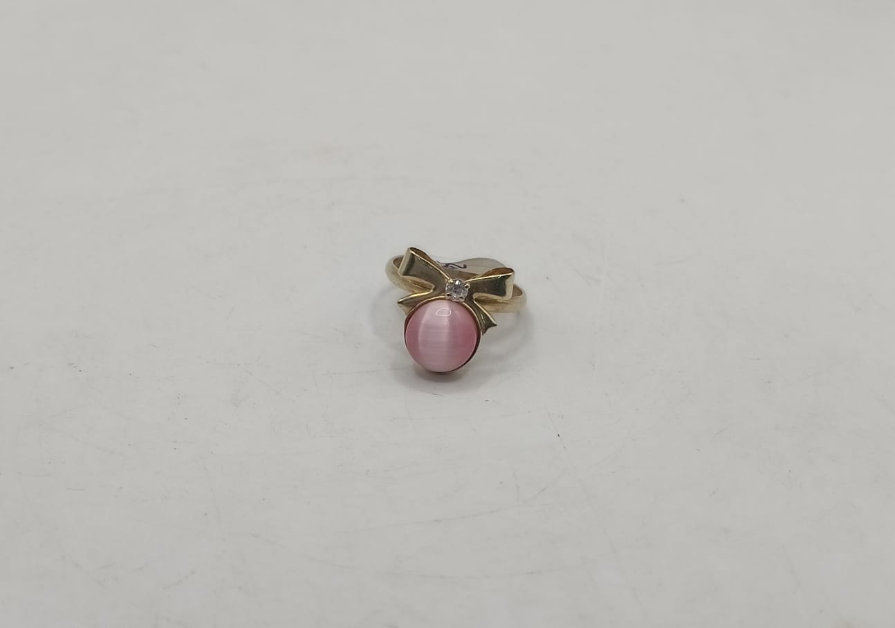Anillo moño ojo de gato ORO 10k peso 1.8gr, usado