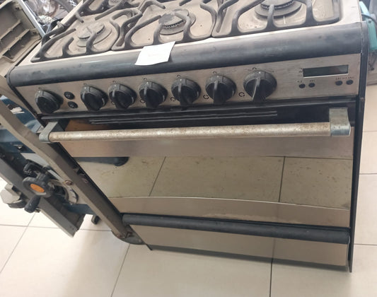Estufa MABE x05500p 6 quemadores acero inaxidable, usado