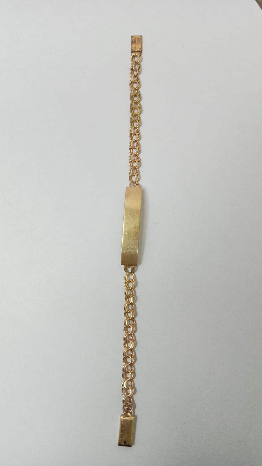 Esclava de oro 10k diseño tejido chino con placa mide 17cm pesa 6.4