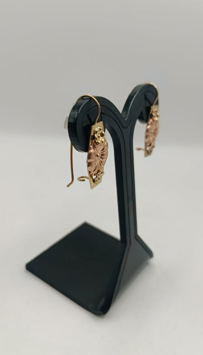 ARETE flor ORO 10K peso 2.7gr, usado