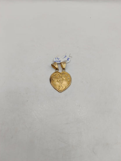 Dije de Corazon partido ORO 8k peso 3.2gr, usado