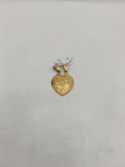 Dije de Corazon partido ORO 8k peso 3.2gr, usado