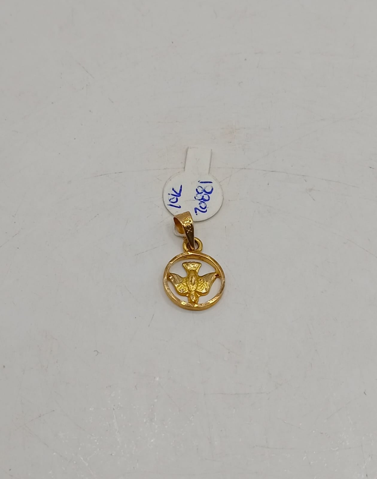 Dije de paloma ORO 10k peso .9gr, usado