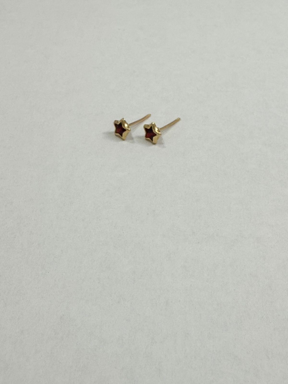 PAR DE BROQUELES DISEÑO ESTRELLA EN ORO DE 10 K