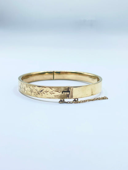 Brazalete Rígido de Oro de 8K con Grabado Floral