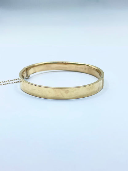 Brazalete Rígido de Oro de 8K con Grabado Floral
