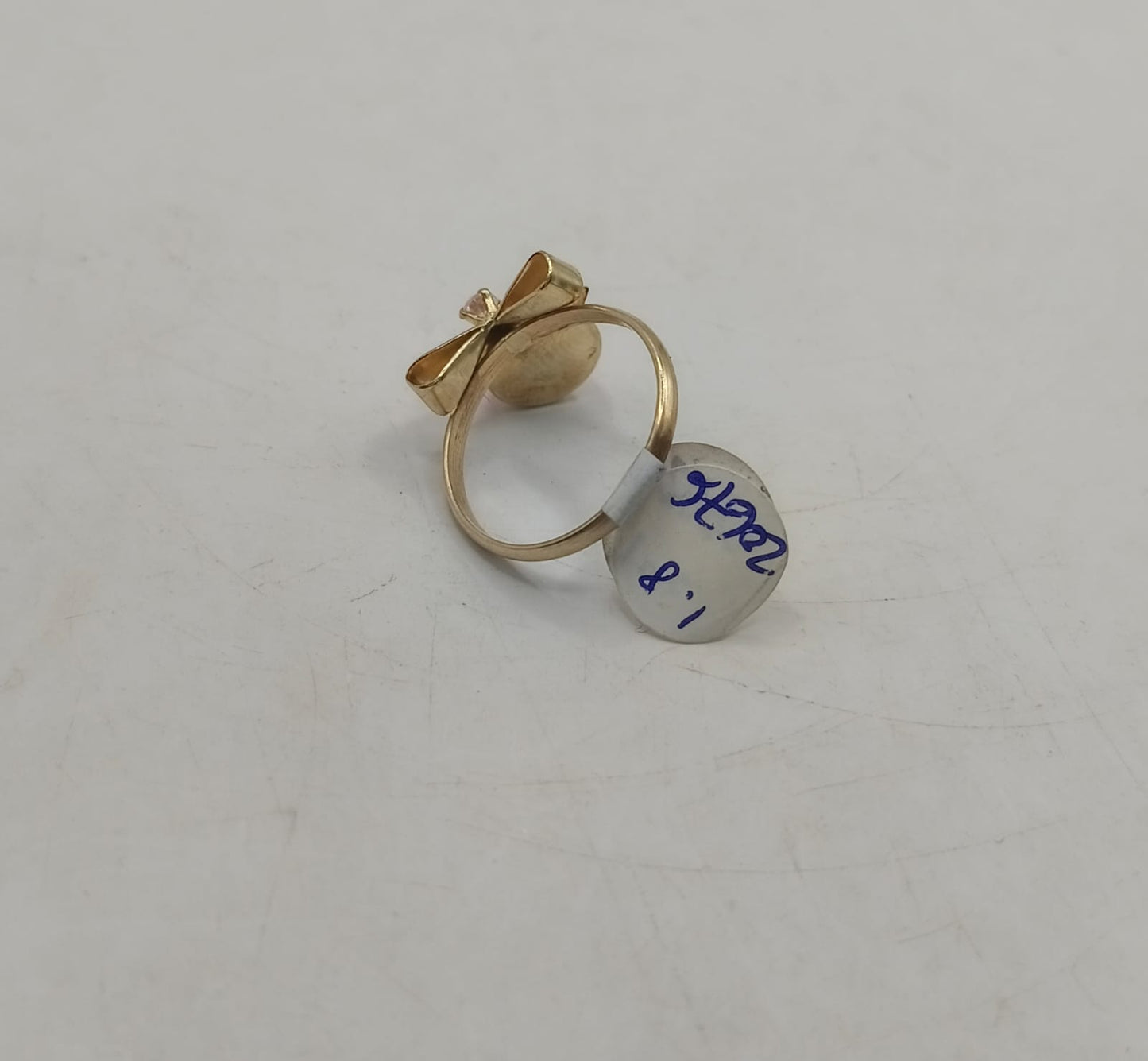 Anillo moño ojo de gato ORO 10k peso 1.8gr, usado