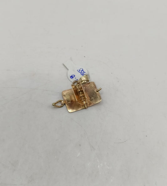 Dije de libro ORO 10k peso 1.8gr, usado