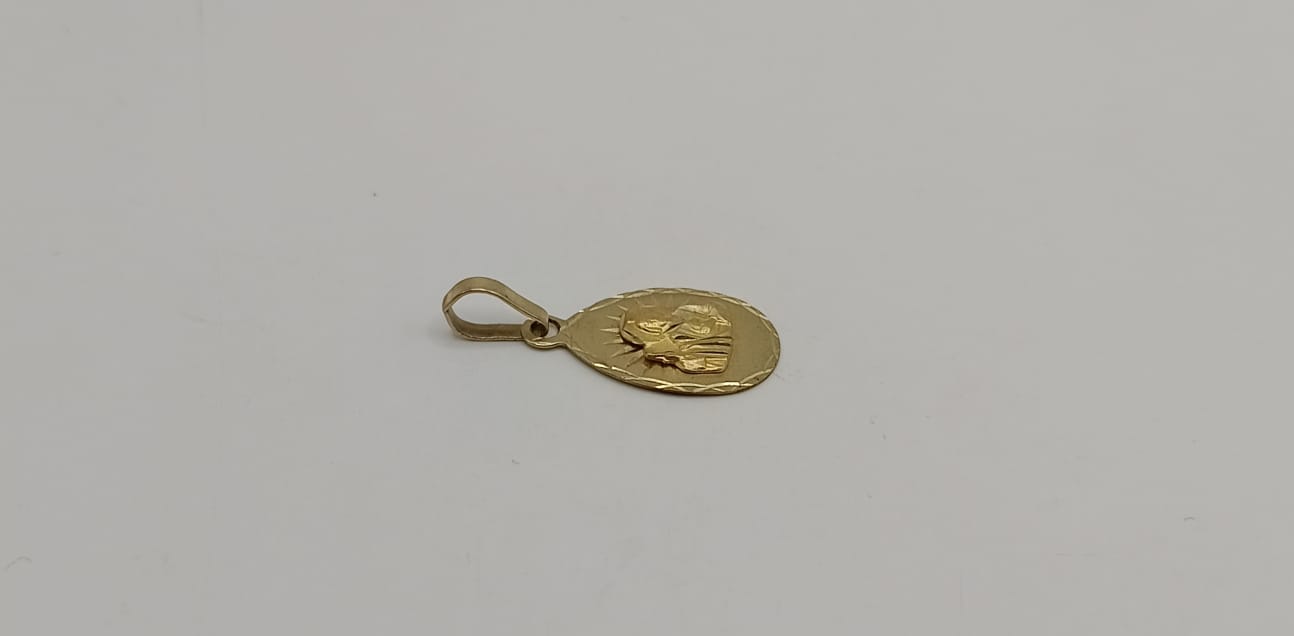 Dije relioso ORO 10k peso 1gr, usado