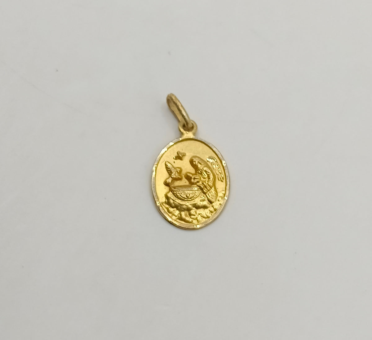 Medalla Religiosa  ORO 10K peso 1gr