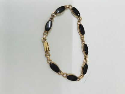 pulsera de oro 10k -diseño sinteticos negros