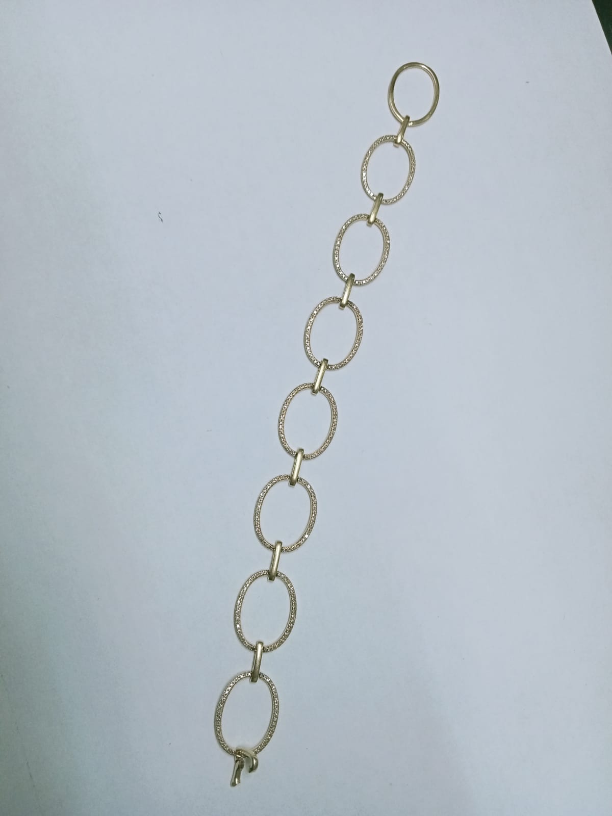 Pulsera de Oro 10k – Aros Entrelazados con Chispitas