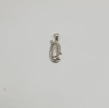 Dije tipo concha PLATA 925 peso 4.4gr, usado