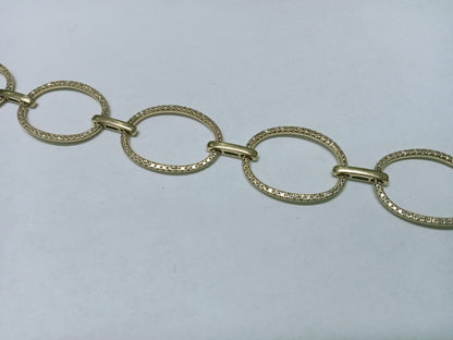 Pulsera de Oro 10k – Aros Entrelazados con Chispitas