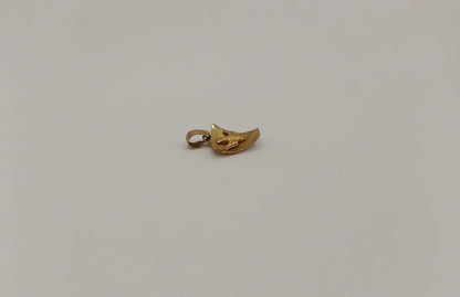 Dije de paloma ORO 8k peso .9gr, usado