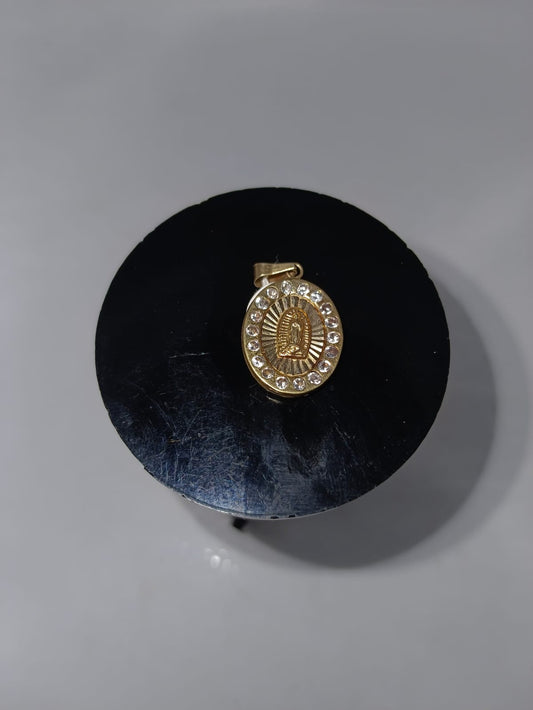 Dije religioso de ORO 10k peso 1.1gr, usado