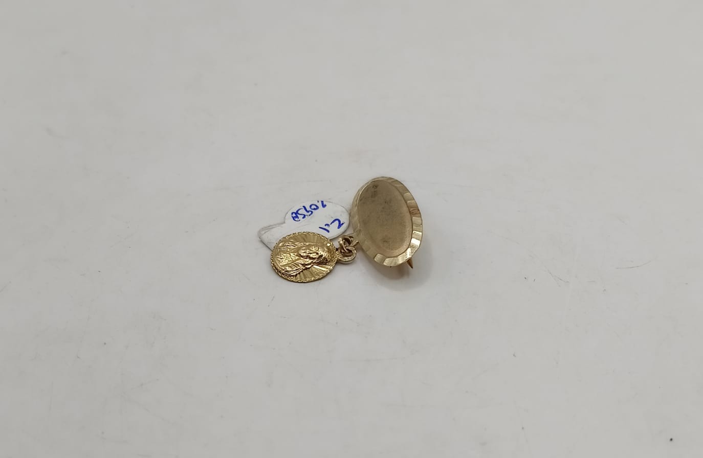 Dije de ORO 10k peso 2.1gr, usado